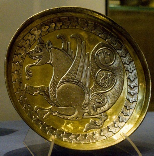 Gilded silver plate with a senmurw